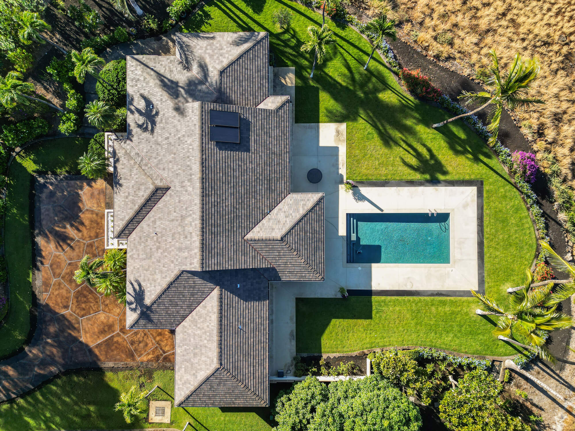 An aerial shot of a local home with roofing done by Kokua.