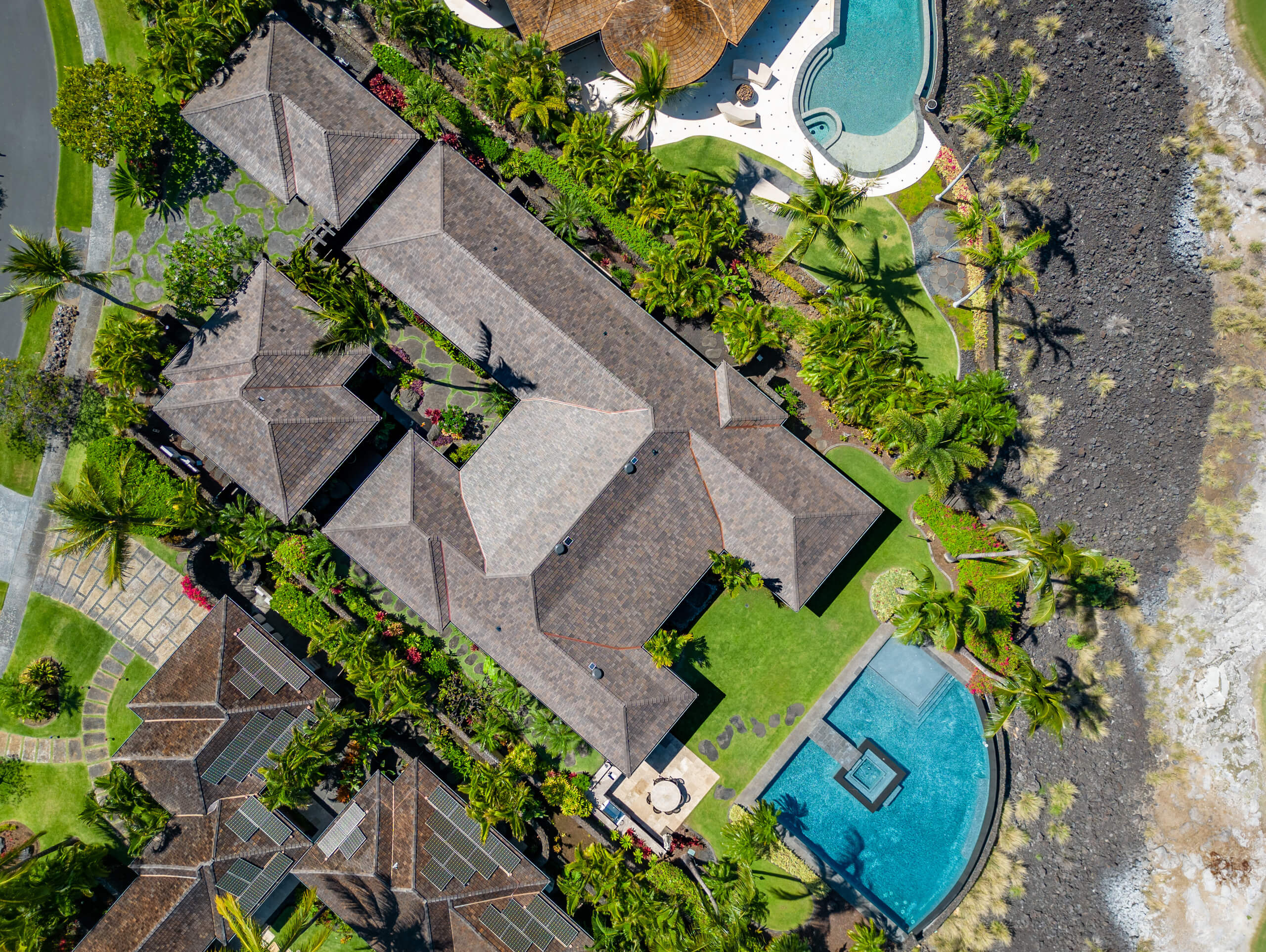 An aerial shot of a local home with roofing done by Kokua.